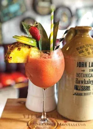 Two cocktails on the bar top